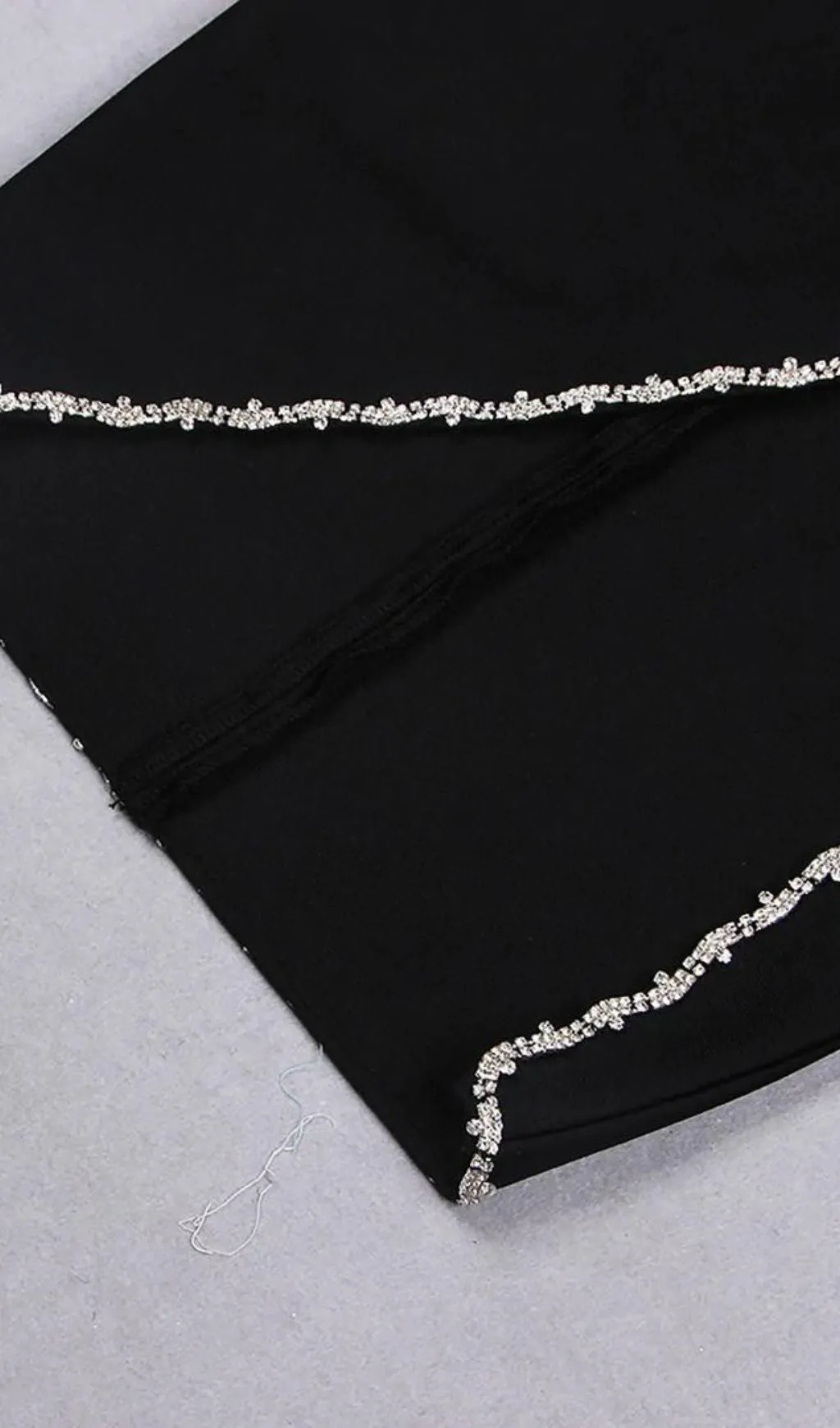 CRYSTAL CUT OUT BANDAGE MIDI DRESS IN BLACK